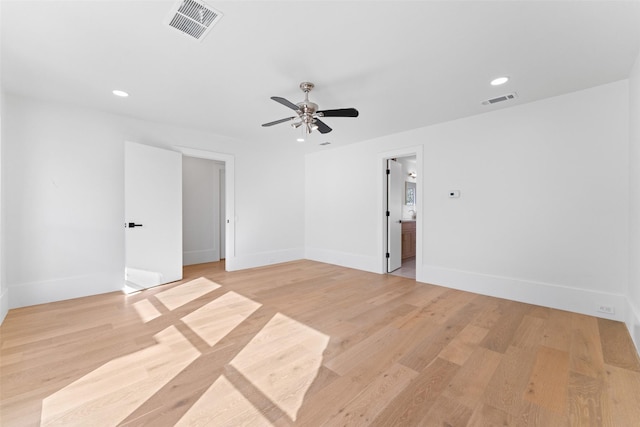 unfurnished room featuring ceiling fan and light hardwood / wood-style flooring