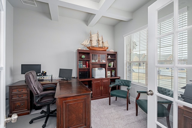 office space with coffered ceiling, beam ceiling, light colored carpet, and french doors