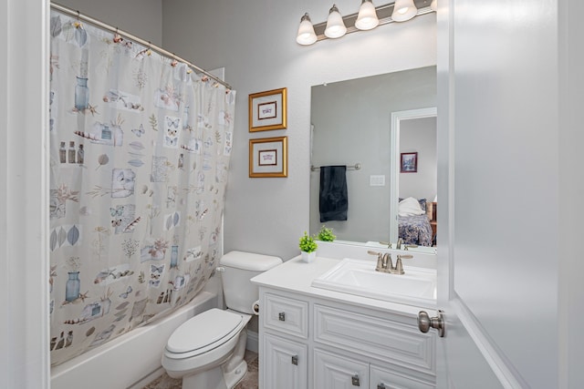 full bathroom with vanity, toilet, and shower / bath combo with shower curtain