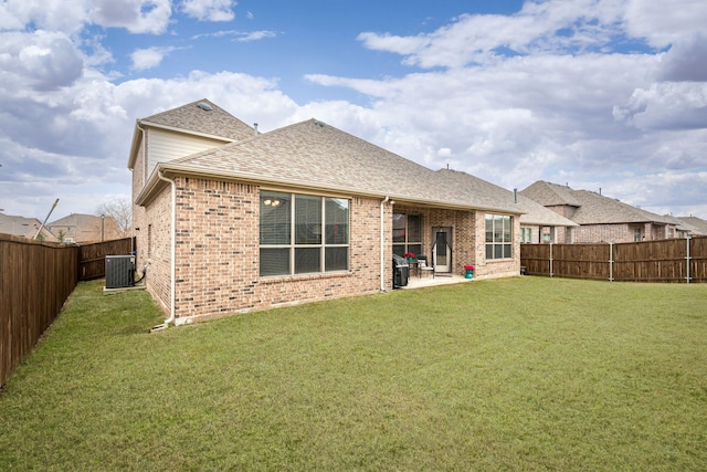 back of property featuring a patio, a yard, and central air condition unit