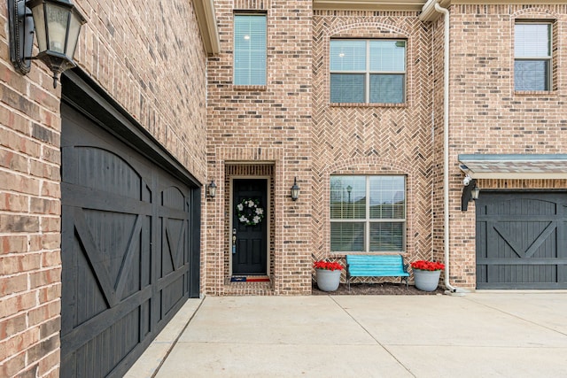 property entrance featuring a garage