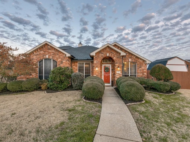 view of front of home featuring a yard