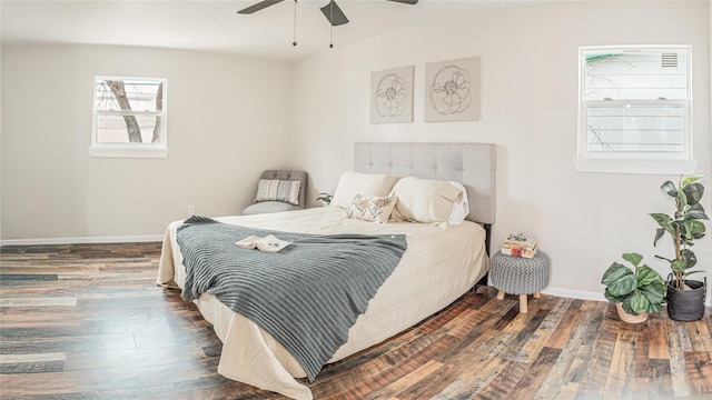 bedroom featuring dark wood-type flooring and ceiling fan