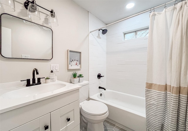 full bathroom featuring vanity, shower / bath combo, and toilet