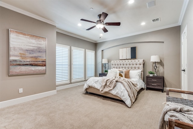 carpeted bedroom with crown molding and ceiling fan