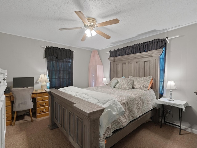 carpeted bedroom featuring ceiling fan and a textured ceiling