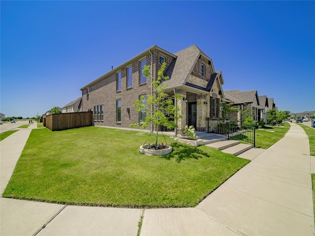 view of front of house with a front lawn