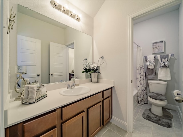 full bathroom with shower / bathtub combination with curtain, vanity, tile patterned floors, and toilet