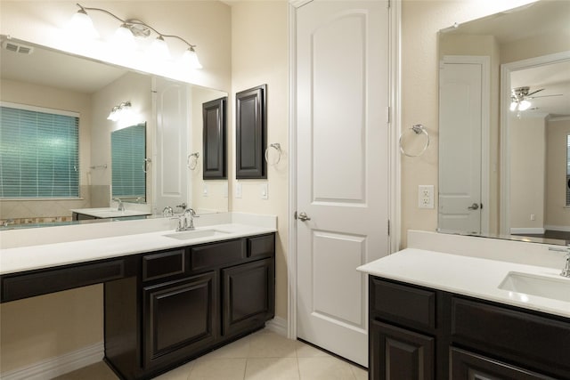 full bathroom with a ceiling fan, visible vents, vanity, and tile patterned floors