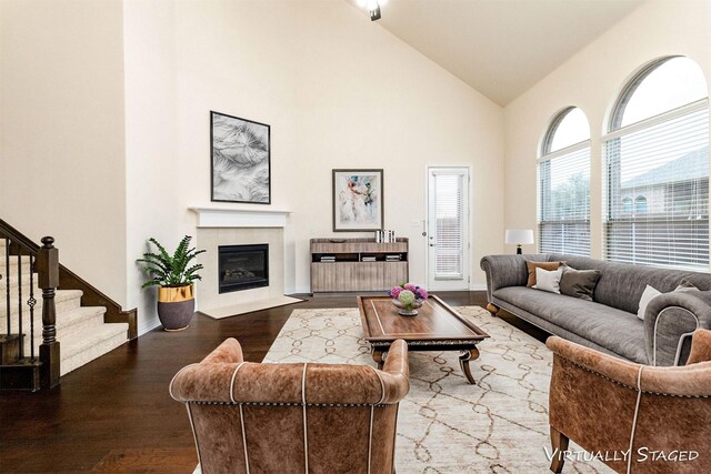 foyer entrance featuring crown molding and dark hardwood / wood-style flooring