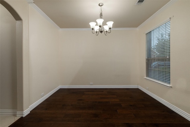 unfurnished room with dark wood-style floors, arched walkways, crown molding, and baseboards