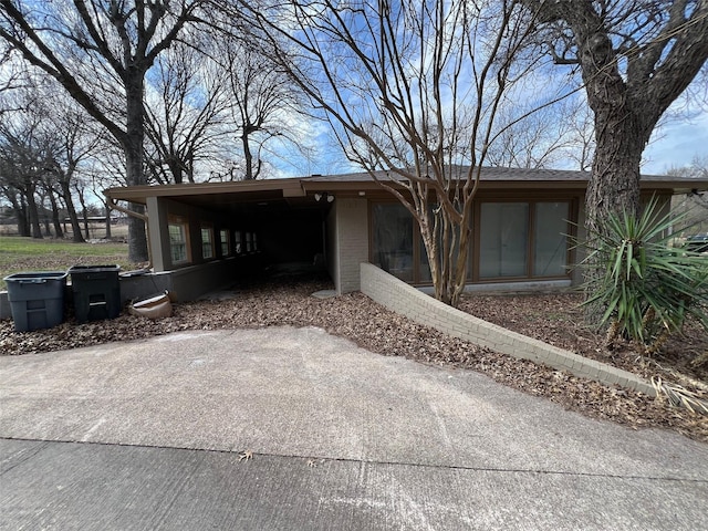 view of front of house with a carport