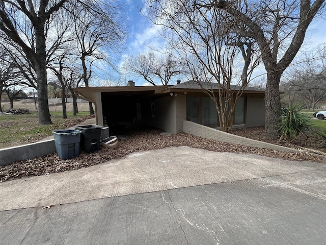 view of front of house featuring a carport