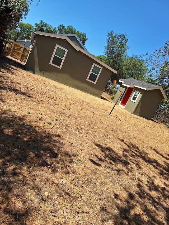 exterior space with a storage unit