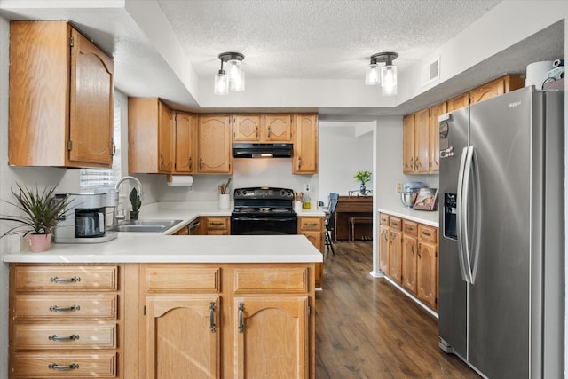 kitchen featuring sink, black range with electric stovetop, dark hardwood / wood-style floors, stainless steel refrigerator with ice dispenser, and kitchen peninsula