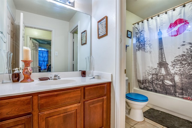 full bathroom featuring tile patterned floors, shower / tub combo, vanity, and toilet