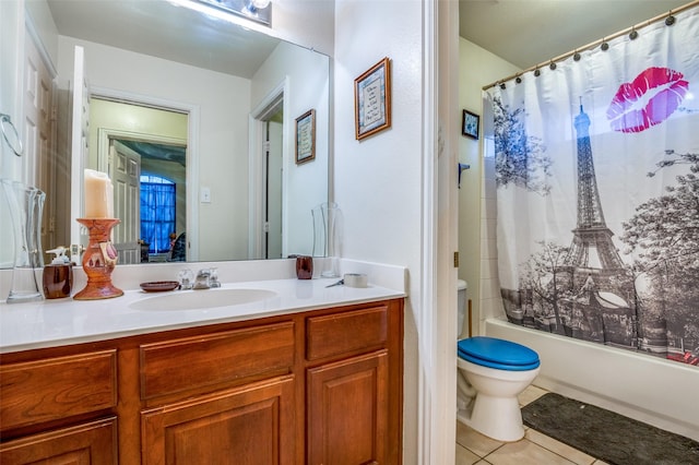 full bathroom with shower / bath combo, toilet, tile patterned floors, and vanity