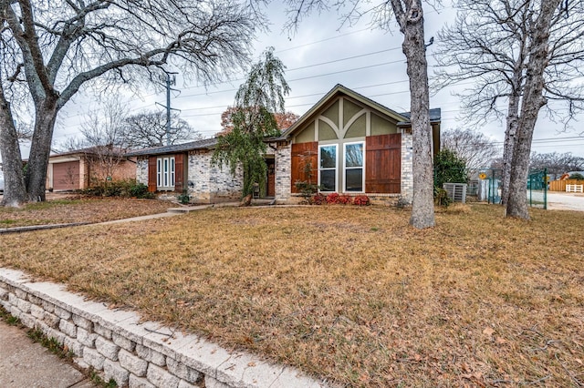 ranch-style house with a front lawn