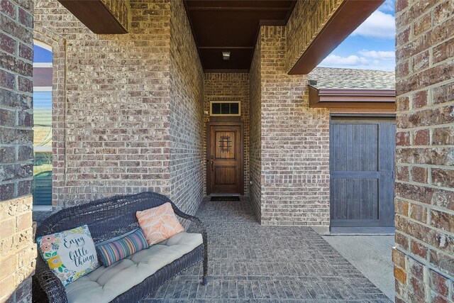 entryway featuring crown molding and dark hardwood / wood-style floors