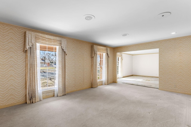 unfurnished room featuring carpet flooring