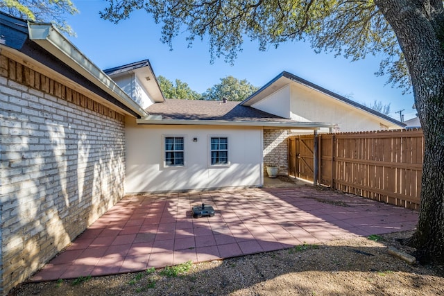 rear view of house featuring a patio area