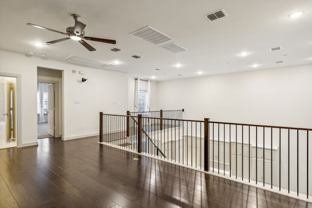 empty room featuring dark hardwood / wood-style flooring