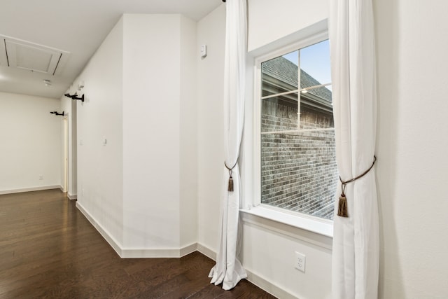 hall with dark hardwood / wood-style floors