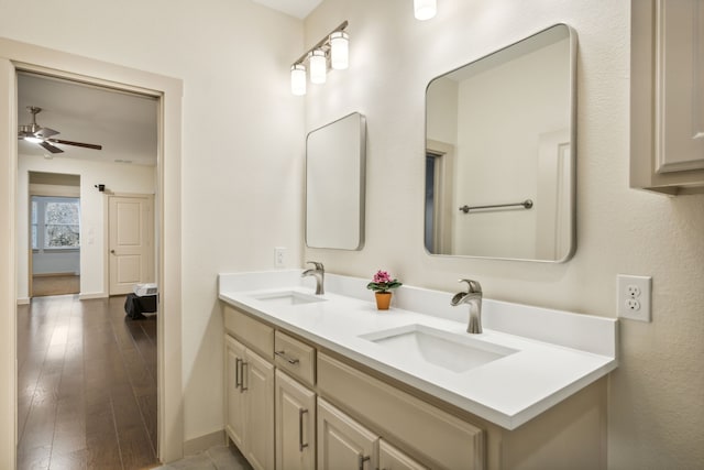 bathroom with vanity, wood-type flooring, and ceiling fan