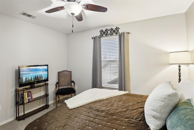 bedroom with ceiling fan and carpet flooring