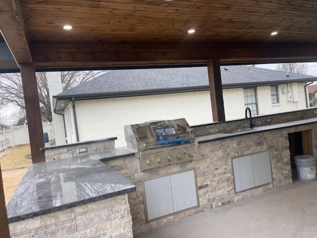 view of patio / terrace with exterior kitchen and area for grilling