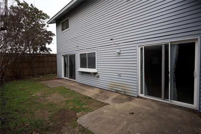 back of house with a patio