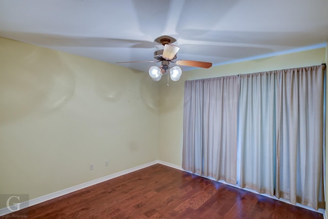 empty room featuring dark hardwood / wood-style floors