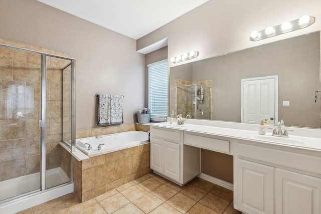 bathroom featuring vanity, plus walk in shower, and tile patterned flooring