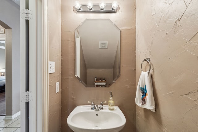 bathroom with sink and tile patterned floors