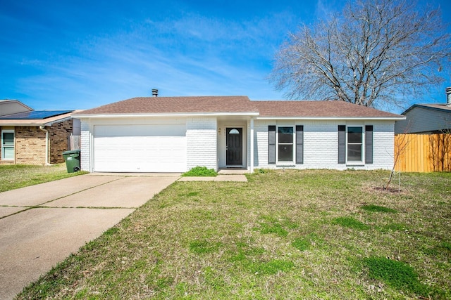 ranch-style house featuring a garage and a front yard