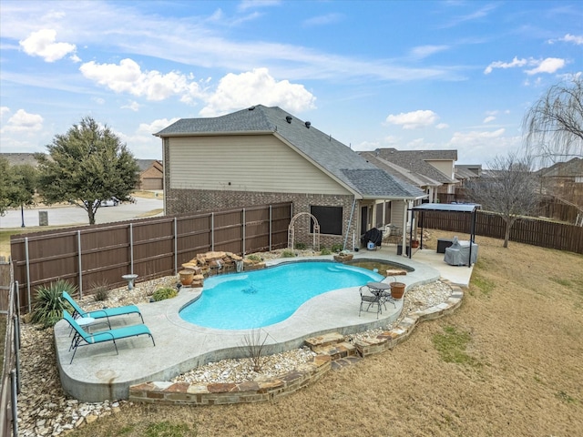 view of swimming pool featuring a patio area