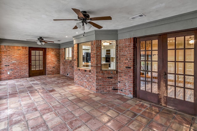 view of patio with french doors and ceiling fan