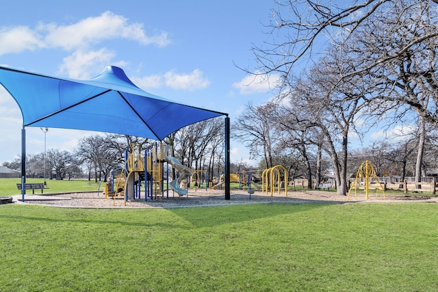 view of playground with a yard