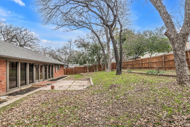 view of yard with a patio area