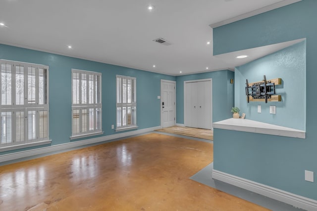 interior space featuring concrete flooring