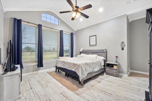 bedroom featuring crown molding, ceiling fan, vaulted ceiling, and light hardwood / wood-style flooring