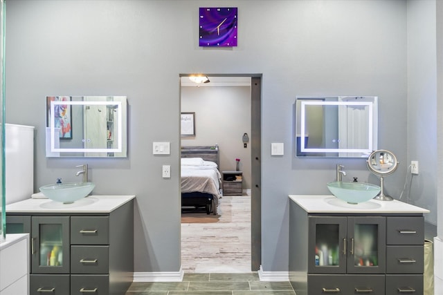 bathroom featuring vanity and hardwood / wood-style floors