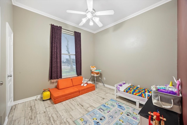 game room featuring wood-type flooring, ornamental molding, and ceiling fan