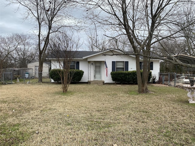 ranch-style house with a front lawn