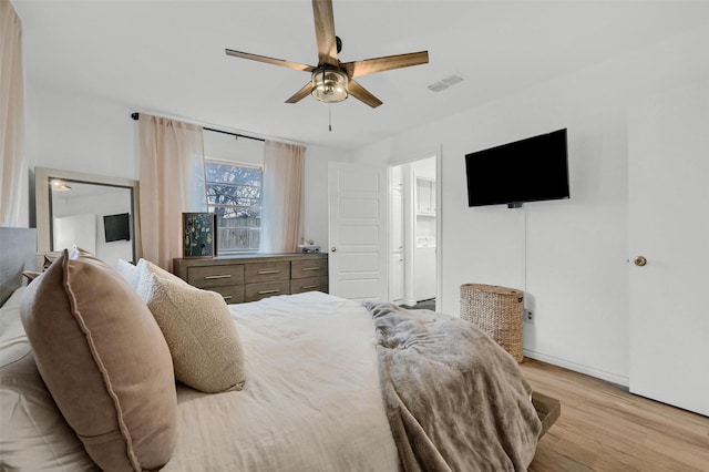 bedroom featuring light hardwood / wood-style flooring and ceiling fan