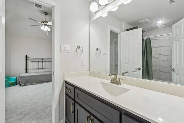 bathroom featuring vanity, ceiling fan, and a shower with shower curtain