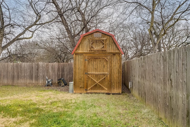 view of outbuilding with a lawn