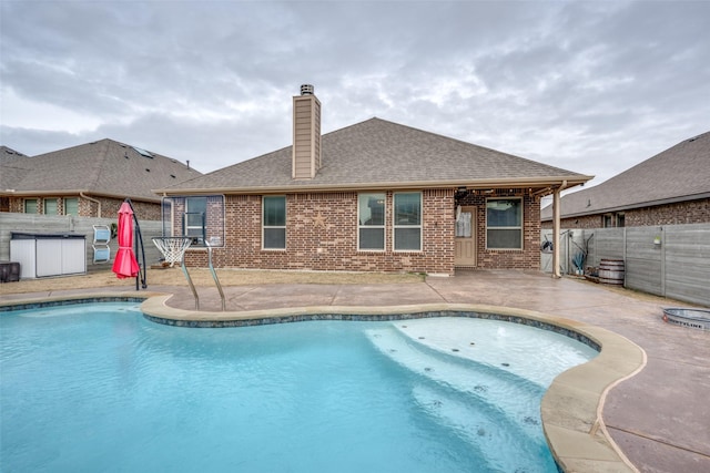 view of swimming pool featuring a patio