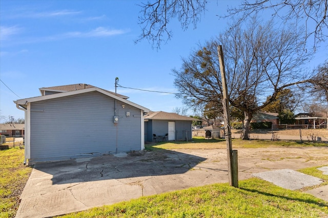 view of property exterior featuring a patio