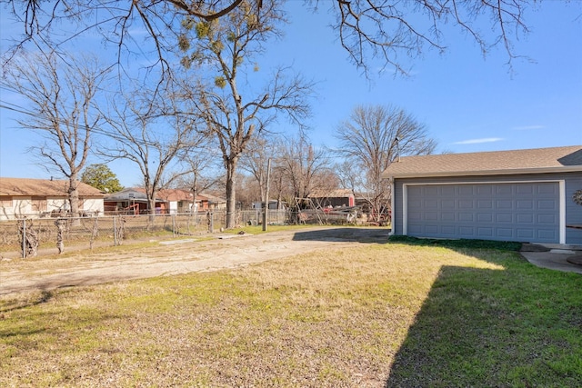 view of yard featuring a garage